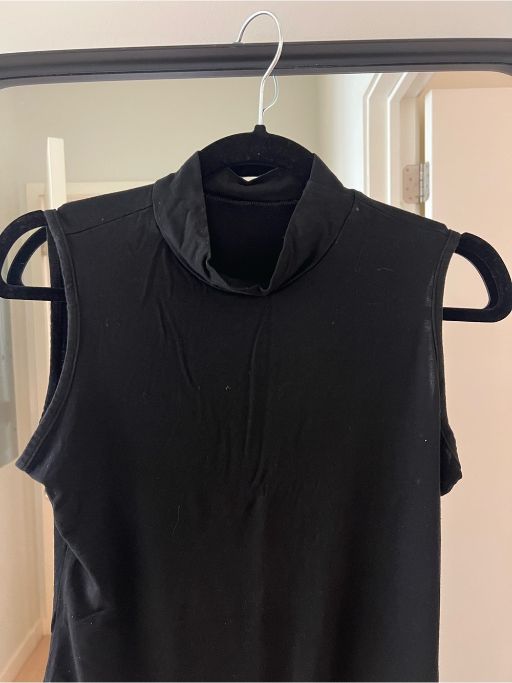 Sleeveless Black Mockneck Bodysuit